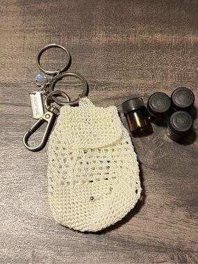 Handmade Crochet Backpack Keychain with Small Essential Oil Bottles..